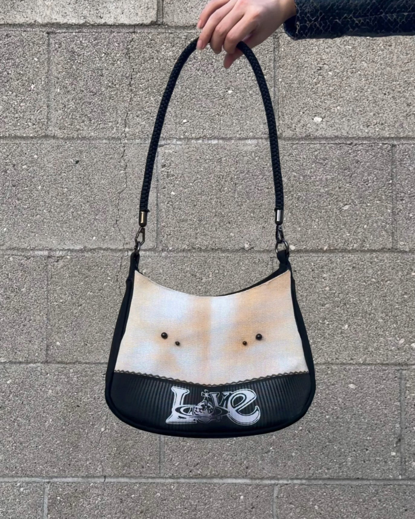 1 of 1 pierced torso print baguette bag