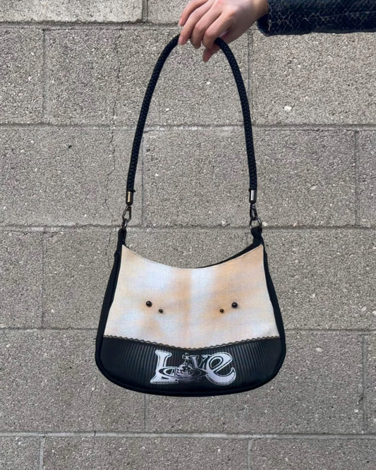 1 of 1 pierced torso print baguette bag