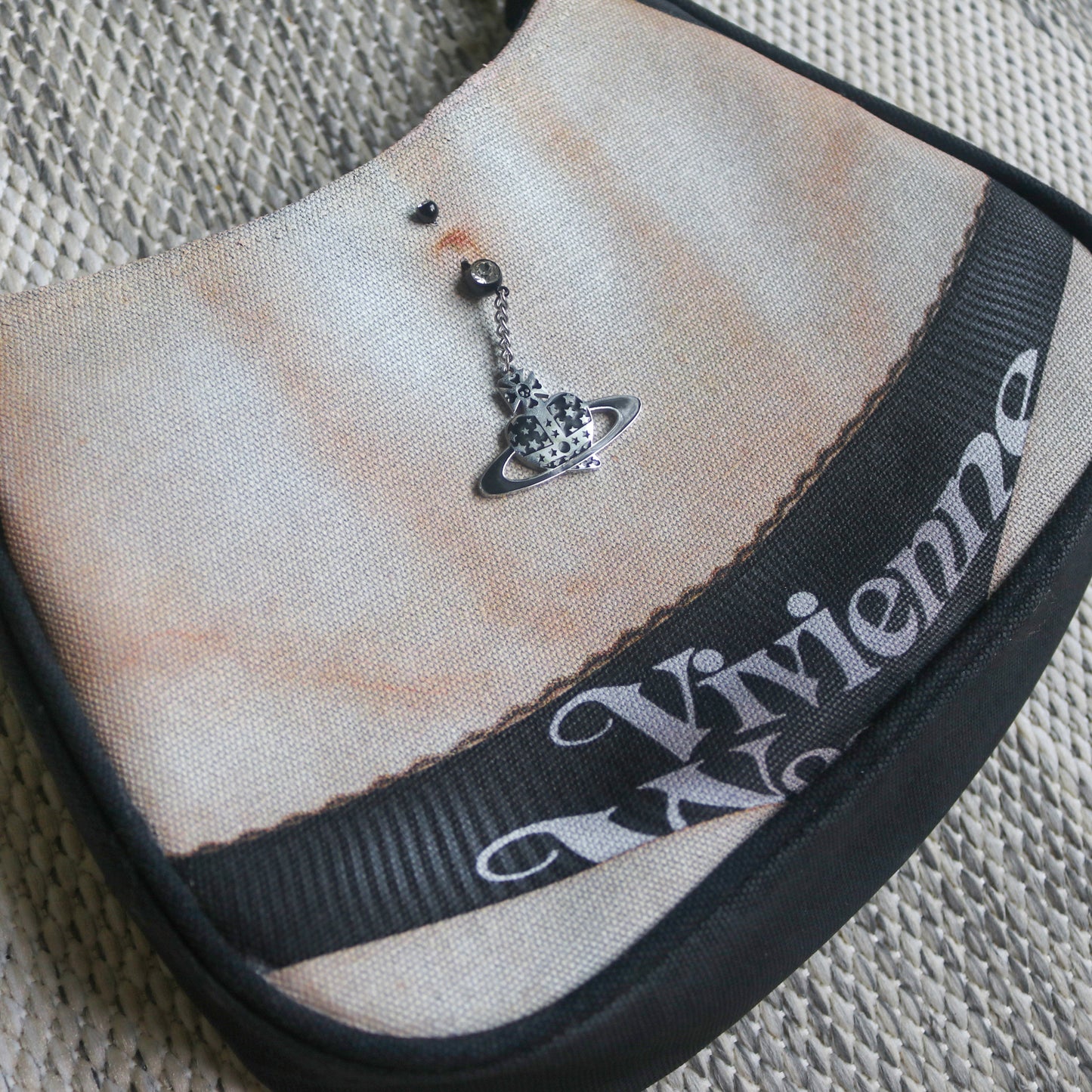 1 of 1 pierced torso print baguette bag