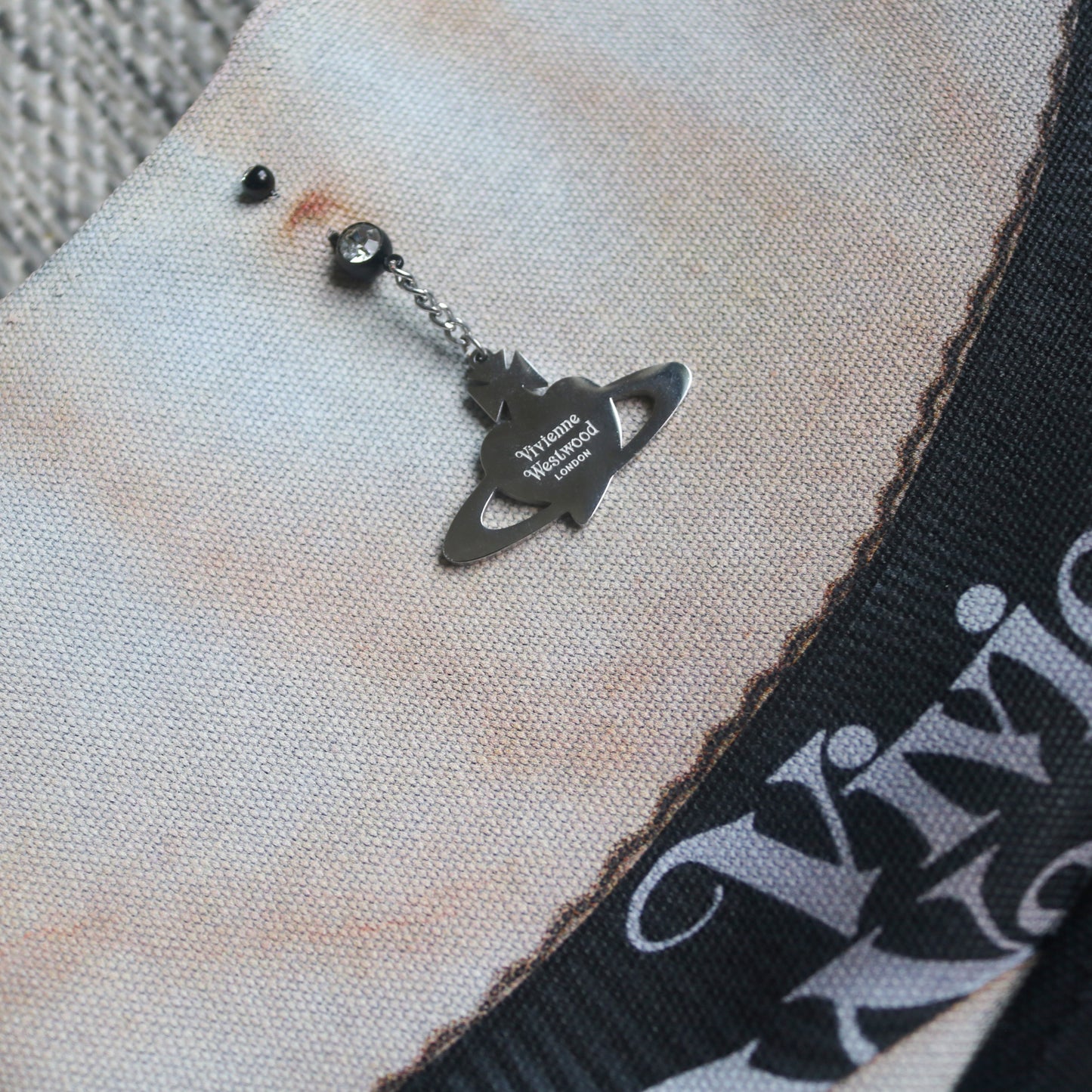 1 of 1 pierced torso print baguette bag