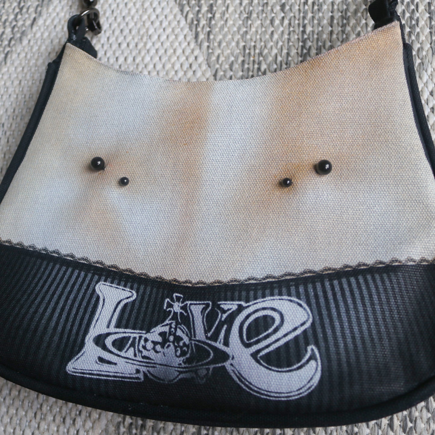 1 of 1 pierced torso print baguette bag