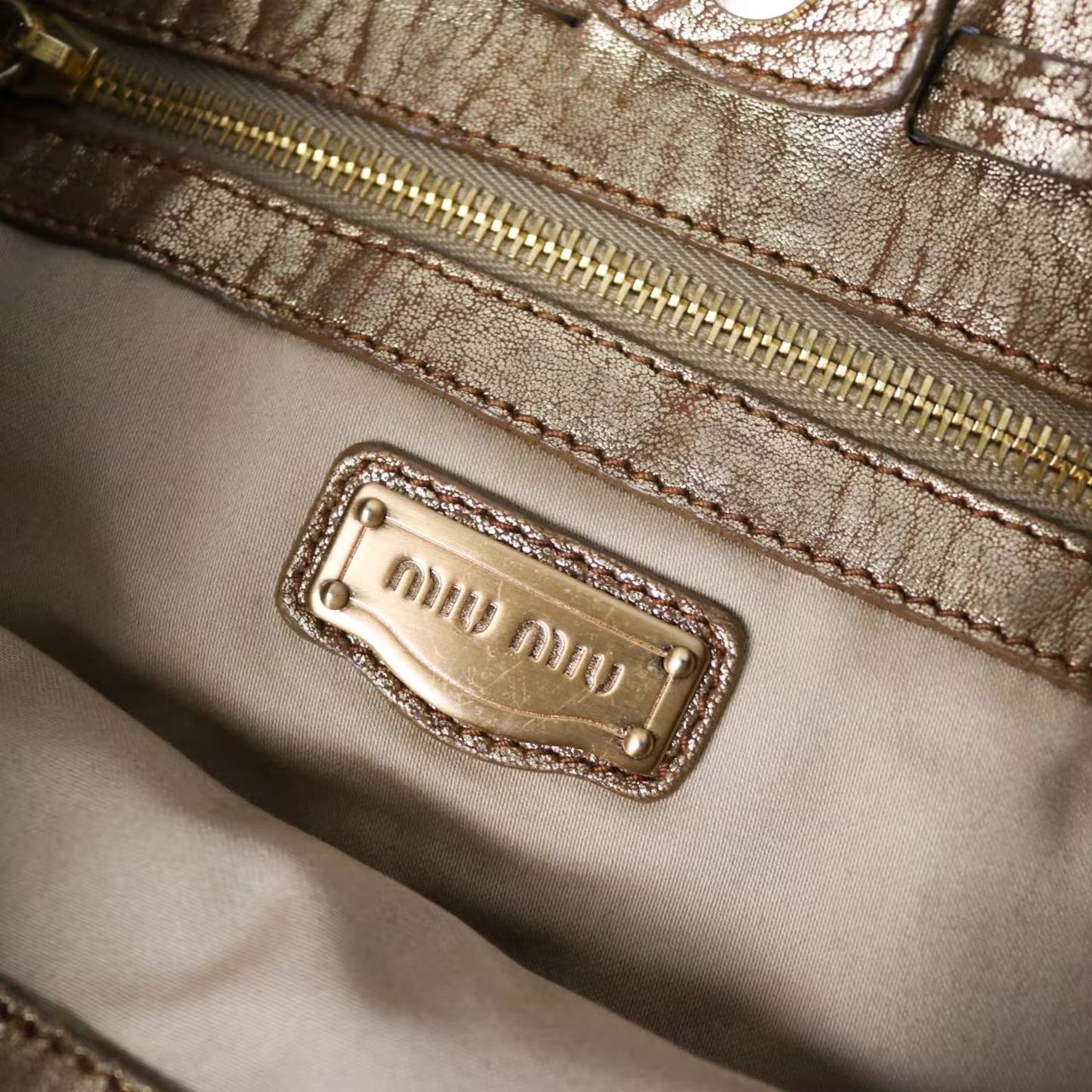 Miu Miu metallic distressed leather hobo bag